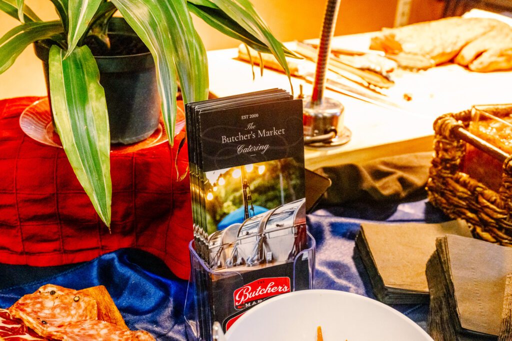 If you're looking for premium catering options in Wake County, North Carolina, look no further than The Butcher's Market. Located in the heart of Raleigh, Cary, Holly Springs, and Apex, our butcher shop offers high-quality meats, local delicacies, and exceptional catering services that will make your next event unforgettable. Whether you’re planning a wedding, corporate event, or a family celebration, we provide custom catering menus tailored to your needs. At The Butcher's Market, we understand the importance of fresh, locally sourced ingredients in creating the best catering experience for our clients in Raleigh, Cary, Holly Springs, and Apex. Our gourmet catering services bring a unique flavor to your event, with everything from premium steaks and barbecue platters to custom charcuterie boards and artisan sandwiches. Our locally sourced meats come from North Carolina’s finest farms, ensuring your guests enjoy only the highest quality products. As one of the leading butcher shops in Wake County, we specialize in providing tailored catering services for all types of events. Whether you're hosting a private party in Cary, a wedding reception in Apex, or a corporate luncheon in Raleigh, The Butcher's Market is here to deliver a memorable experience. We offer a variety of meat platters, custom BBQ catering, and freshly prepared dishes that will satisfy every palate. Our chefs can prepare everything from roast beef and grilled chicken to specialty items like brisket and pulled pork, all expertly seasoned and cooked to perfection. When you choose The Butcher's Market for your catering needs, you're choosing more than just food. We pride ourselves on providing personalized customer service that ensures your event runs smoothly. From event planning to on-site catering, our team is dedicated to delivering top-notch service that exceeds expectations. Whether you're hosting a casual event in Holly Springs or a more formal gathering in Raleigh, we have the expertise and local knowledge to make your event stand out. Our catering services also include vegetarian options, side dishes, and dessert selections, ensuring that every guest is satisfied. Contact The Butcher's Market today for all your catering needs in Wake County and experience the difference that high-quality, locally sourced meats can make at your next event.